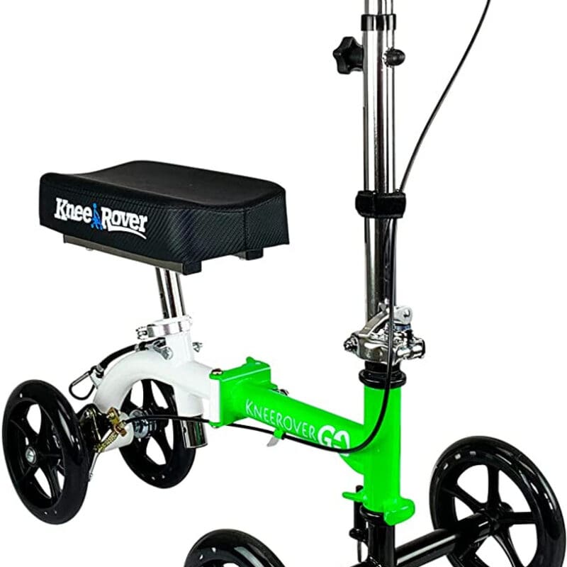 A green and white scooter with a seat on the front.